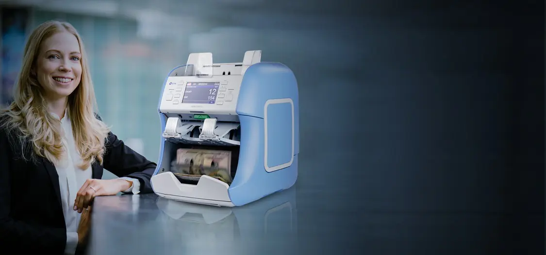 Cum să alegi mașina de numărat și sortat bani potrivită pentru o afacere din retail?